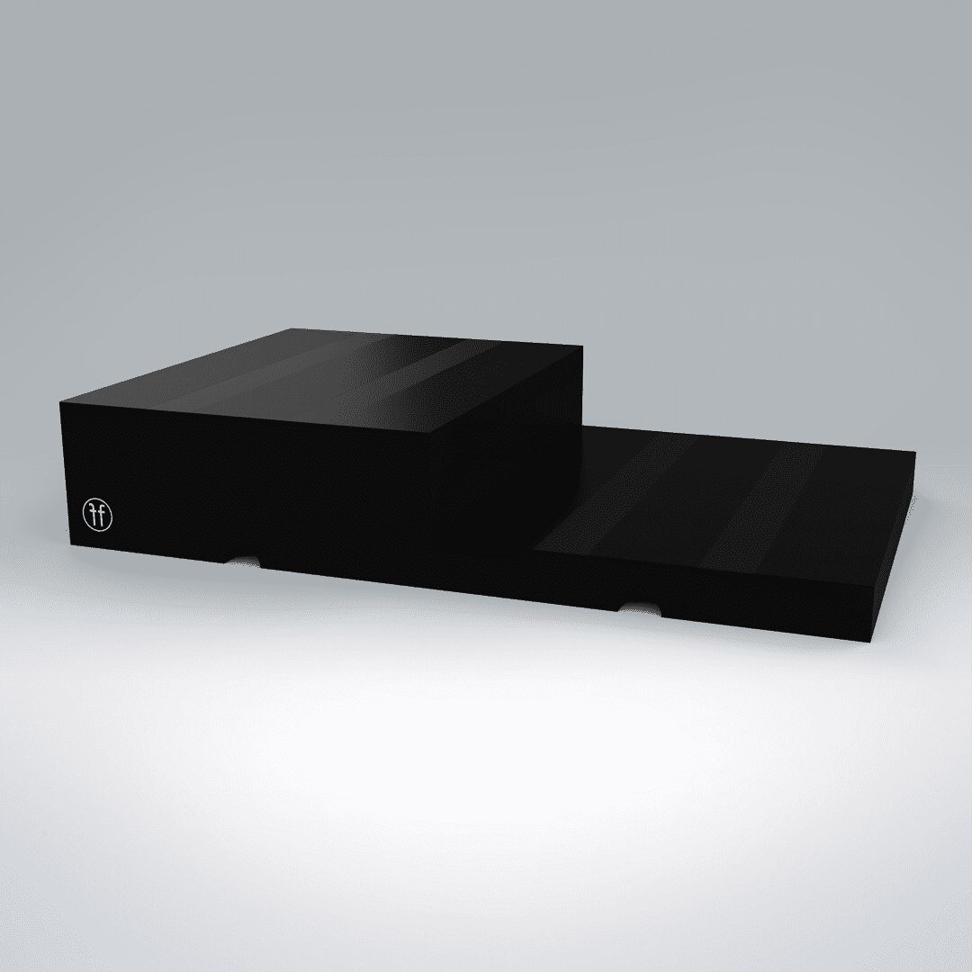 STEP BOARD A Forte Fitness step in black. There are two levels of step, with grey stripes through the design. The logo is placed on the bottom left corner of the product in white.