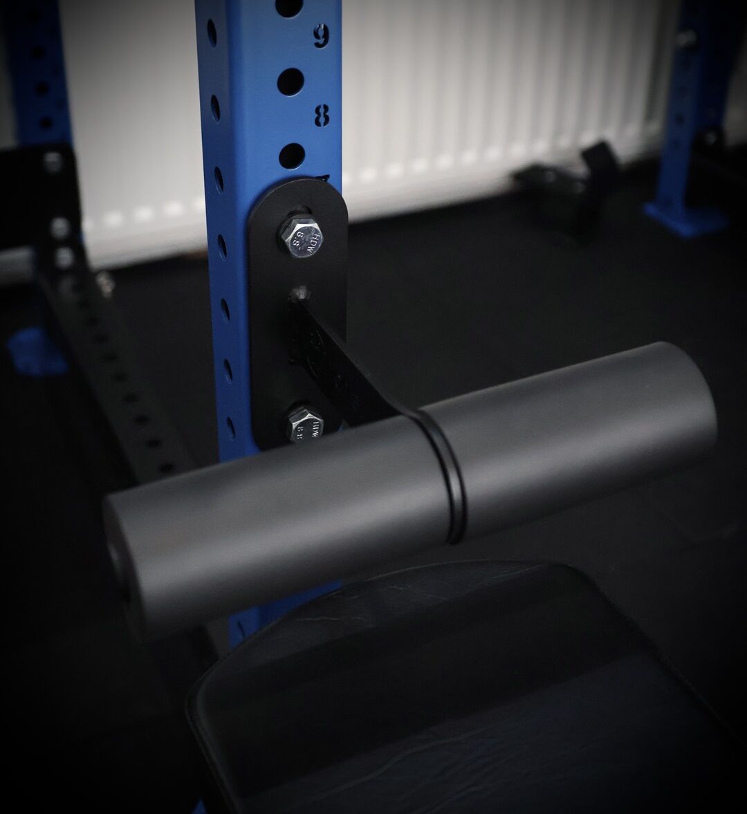nordic. nordic curl attachment mounted on a blue rack