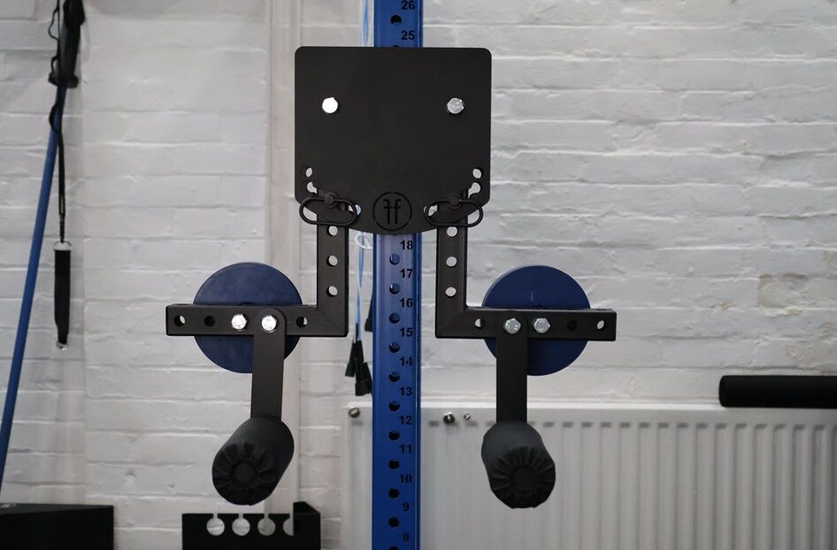 lateral raise. lateral raise attachment on a rack