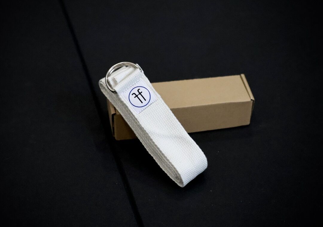 white yoga strap with box white yoga strap with box