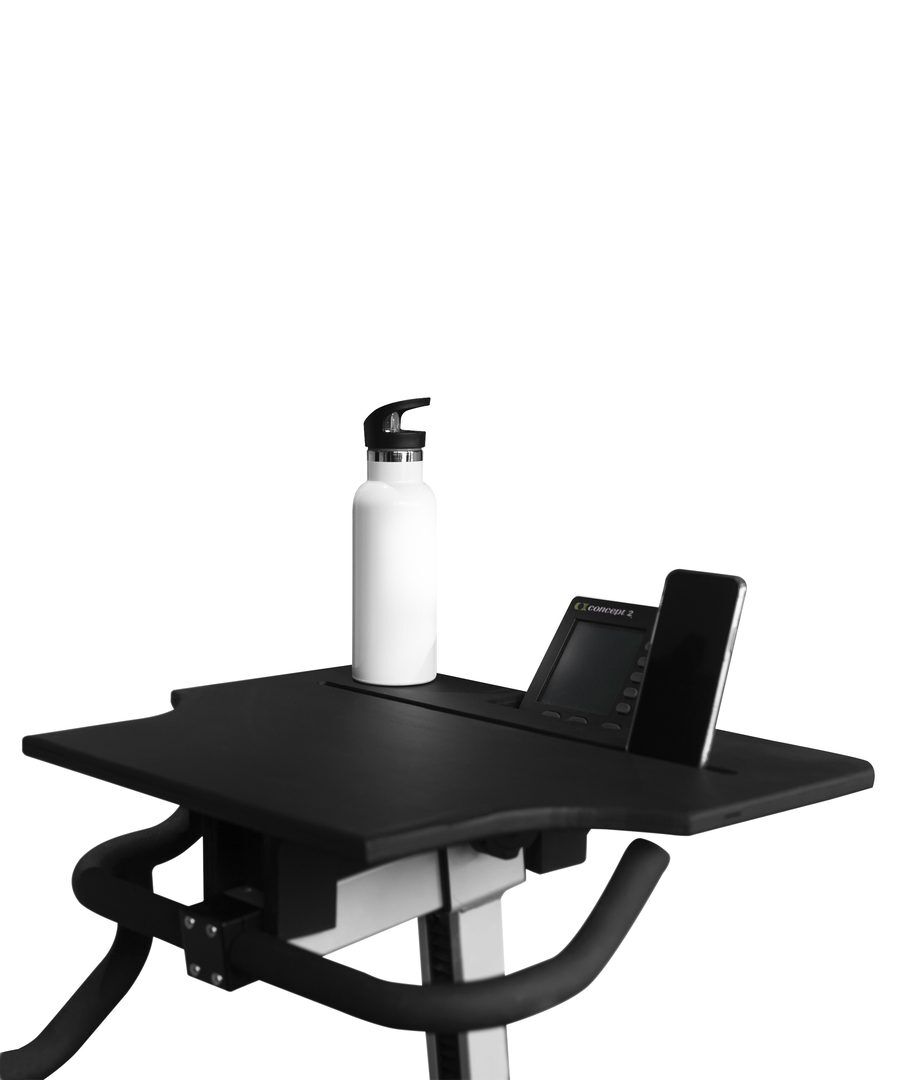 table black bikerg table with phone and white water bottle